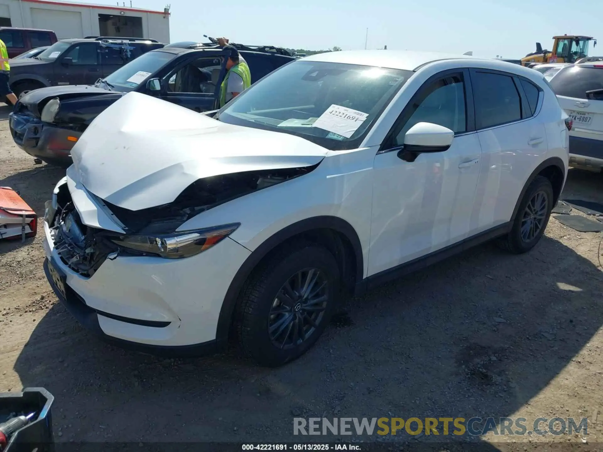 2 fotografías del automóvil dañado JM3KFACM8M0461875 MAZDA CX-5 2021