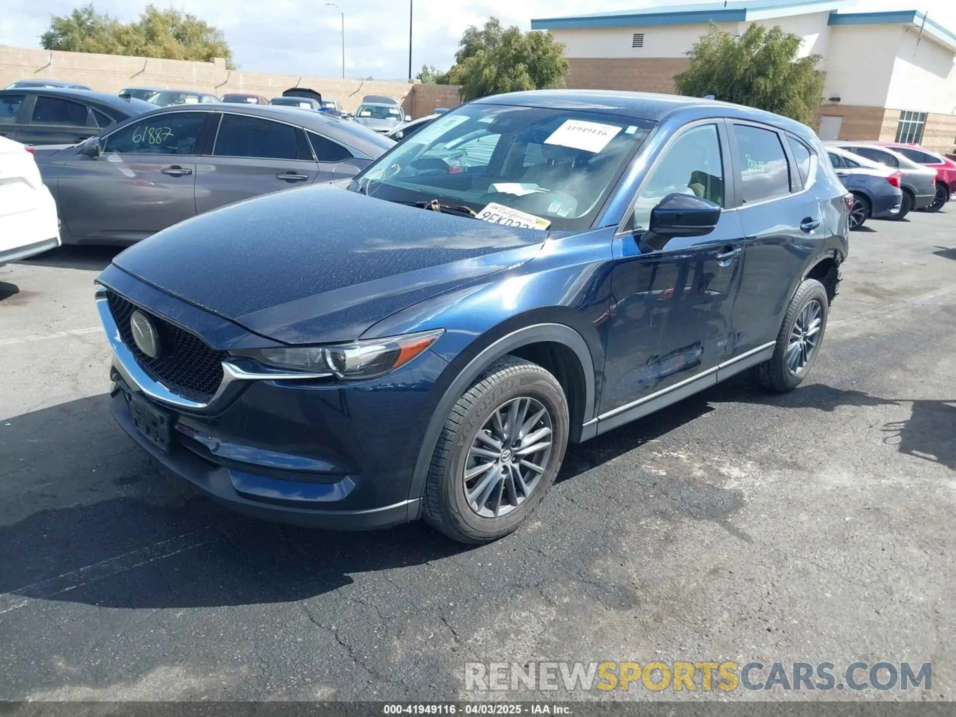 2 fotografías del automóvil dañado JM3KFACM9M0410031 MAZDA CX-5 2021