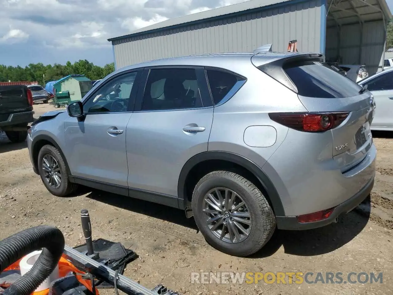 2 fotografías del automóvil dañado JM3KFACMXM0443698 MAZDA CX-5 2021