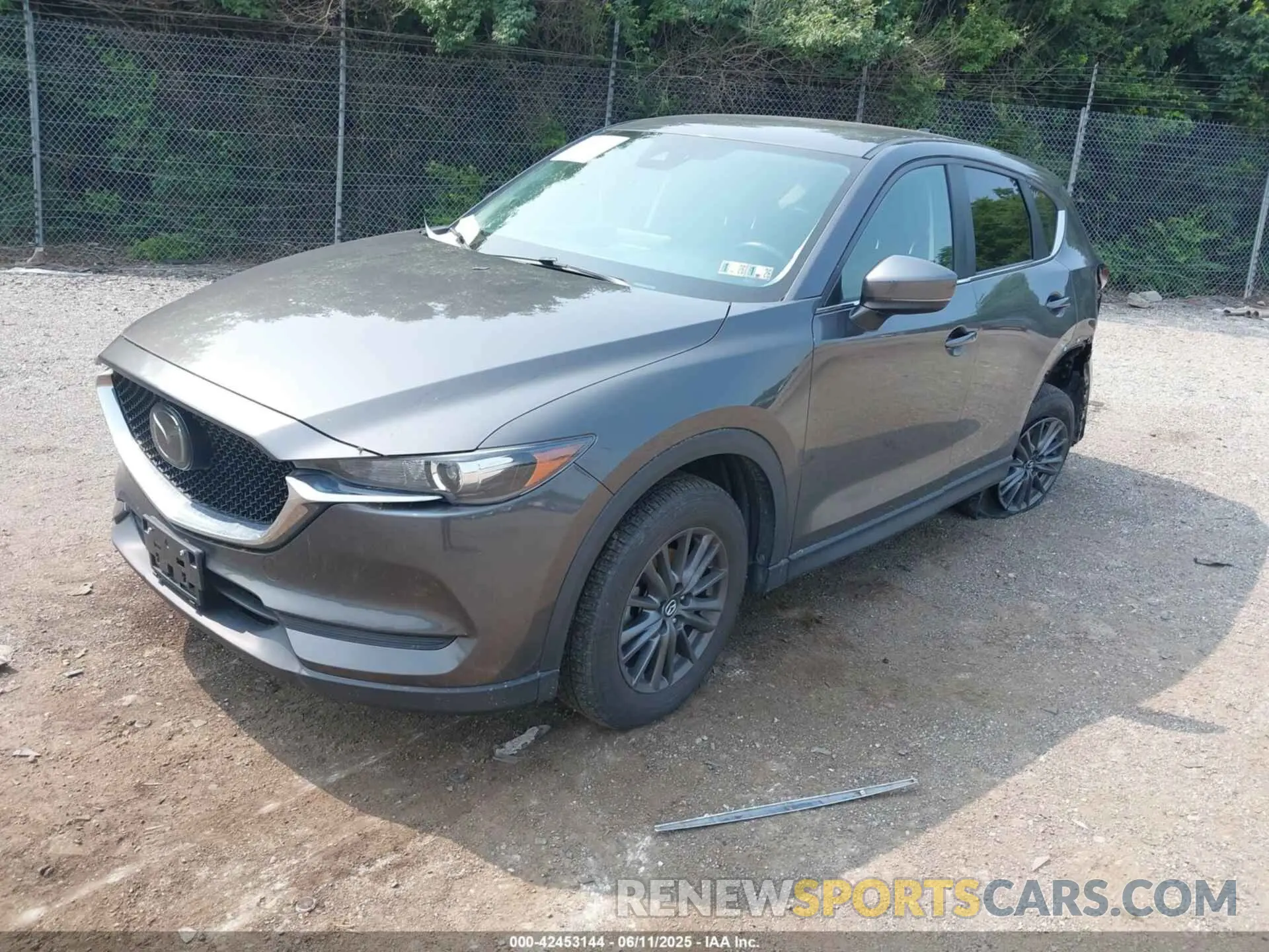2 fotografías del automóvil dañado JM3KFACMXM1333664 MAZDA CX-5 2021