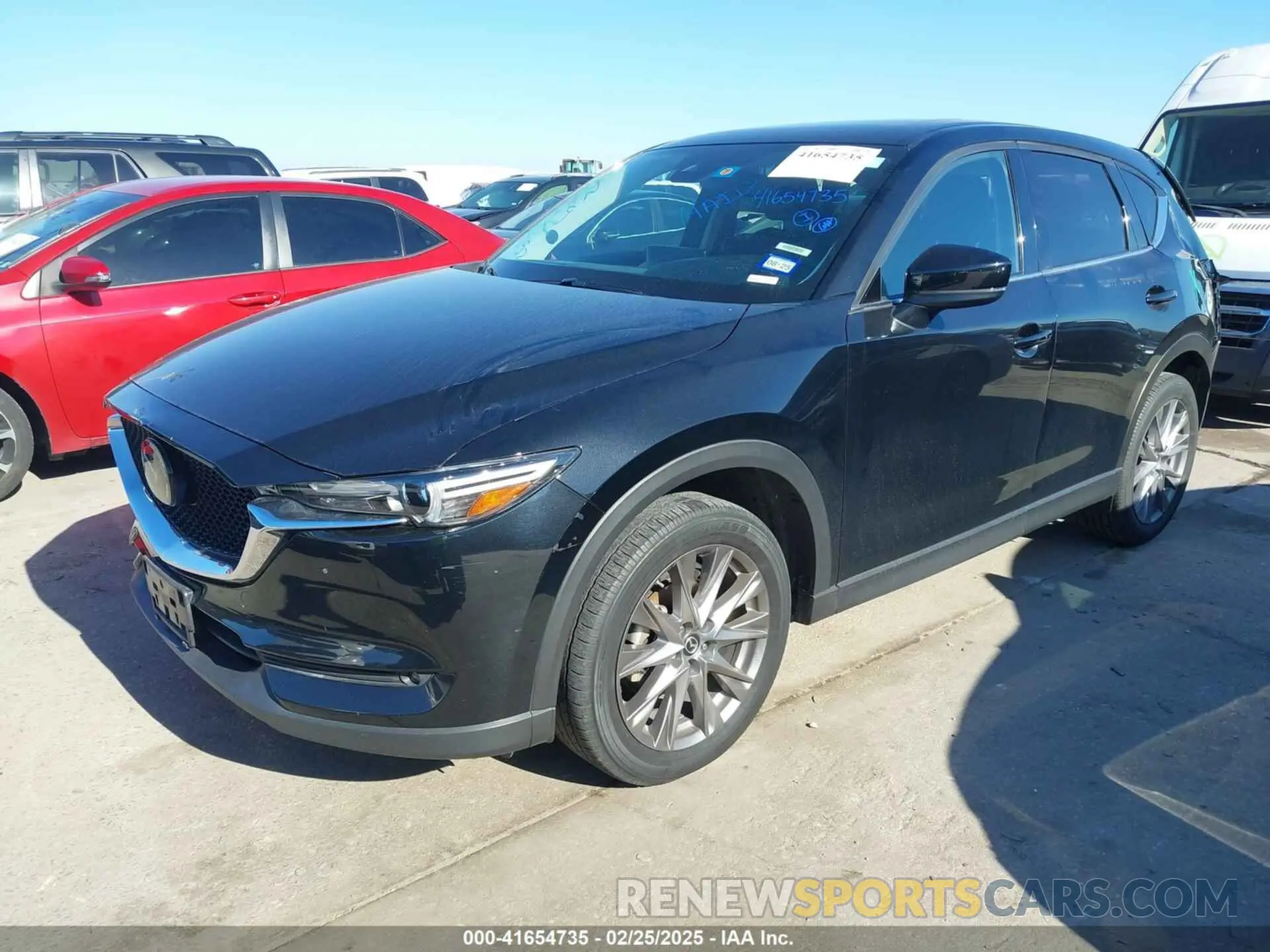 2 fotografías del automóvil dañado JM3KFADM1M0406098 MAZDA CX-5 2021