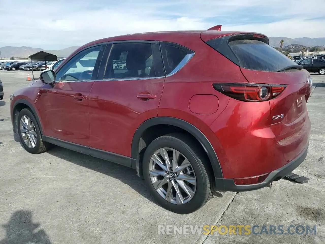 2 fotografías del automóvil dañado JM3KFADM1M0408322 MAZDA CX-5 2021