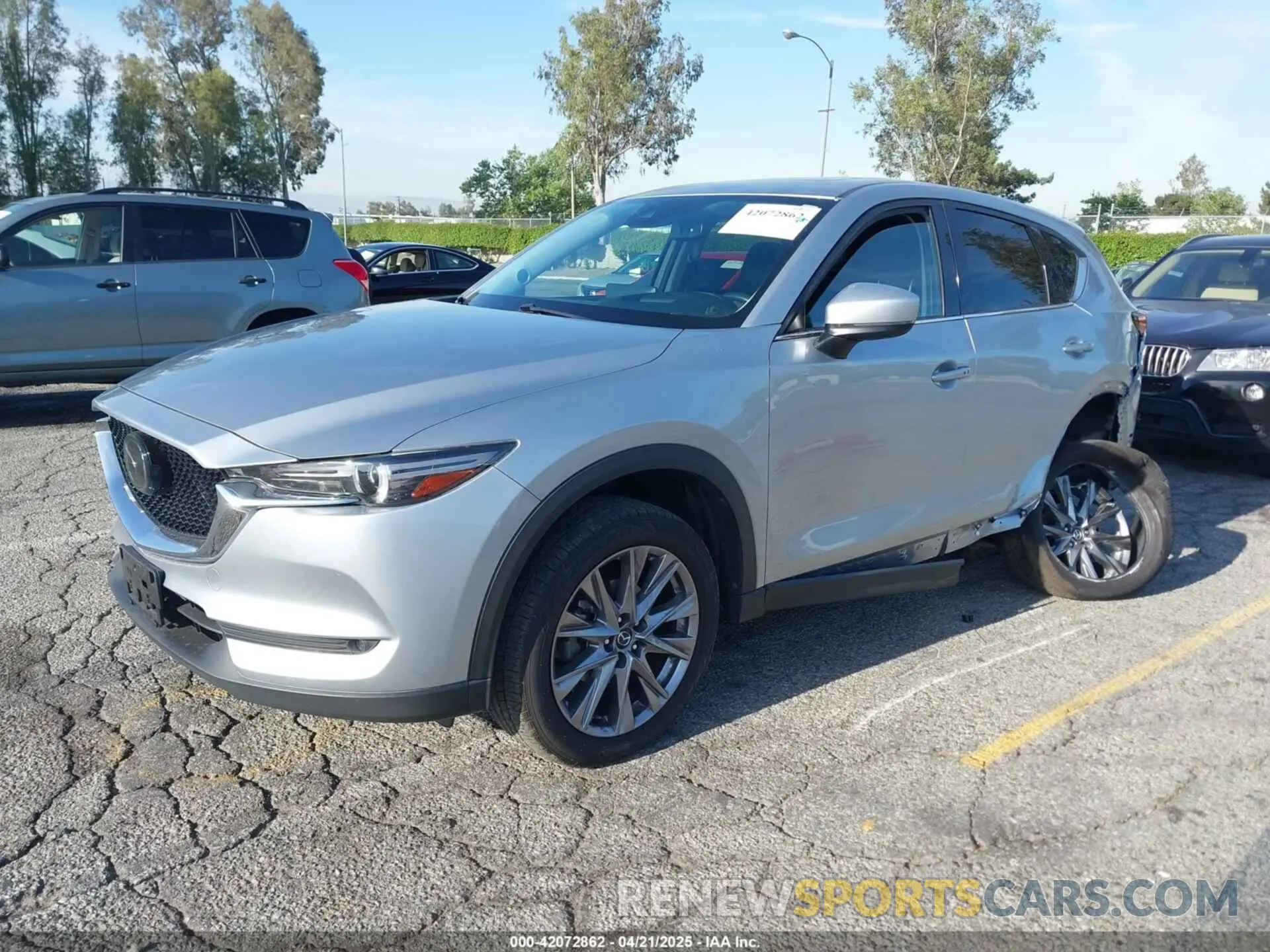 2 fotografías del automóvil dañado JM3KFADM1M1393251 MAZDA CX-5 2021