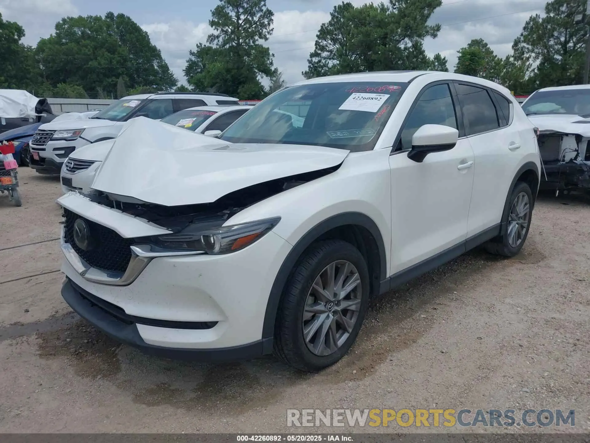 2 fotografías del automóvil dañado JM3KFADM2M1329879 MAZDA CX-5 2021