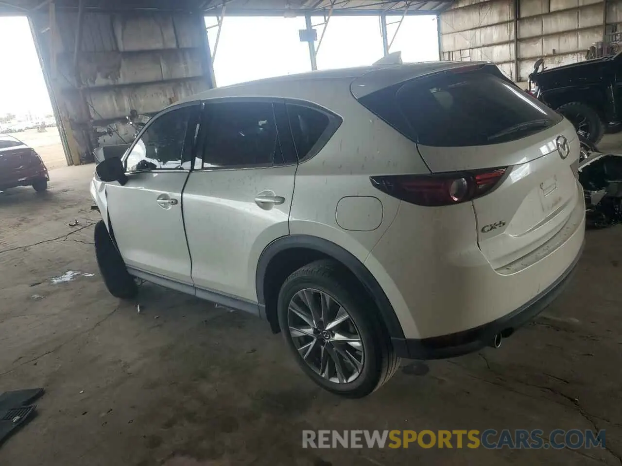 2 fotografías del automóvil dañado JM3KFADM3M1317479 MAZDA CX-5 2021