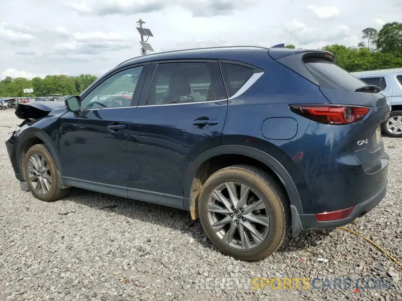 2 fotografías del automóvil dañado JM3KFADM8M0303938 MAZDA CX-5 2021