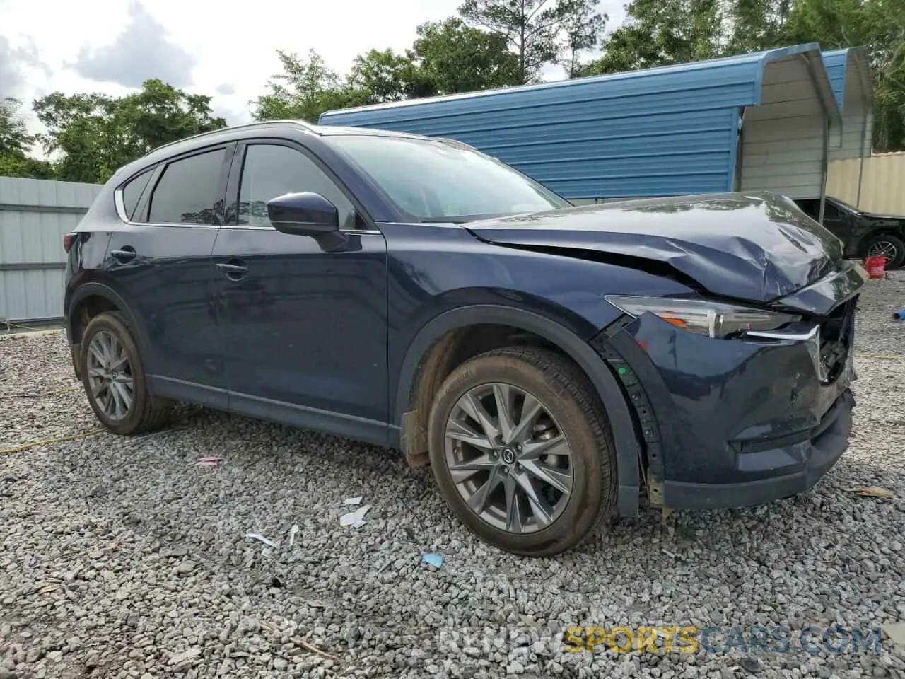 4 fotografías del automóvil dañado JM3KFADM8M0303938 MAZDA CX-5 2021