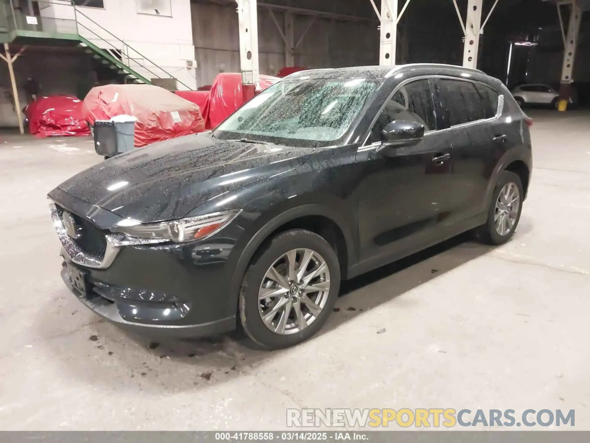 2 fotografías del automóvil dañado JM3KFBAY5M0412046 MAZDA CX-5 2021