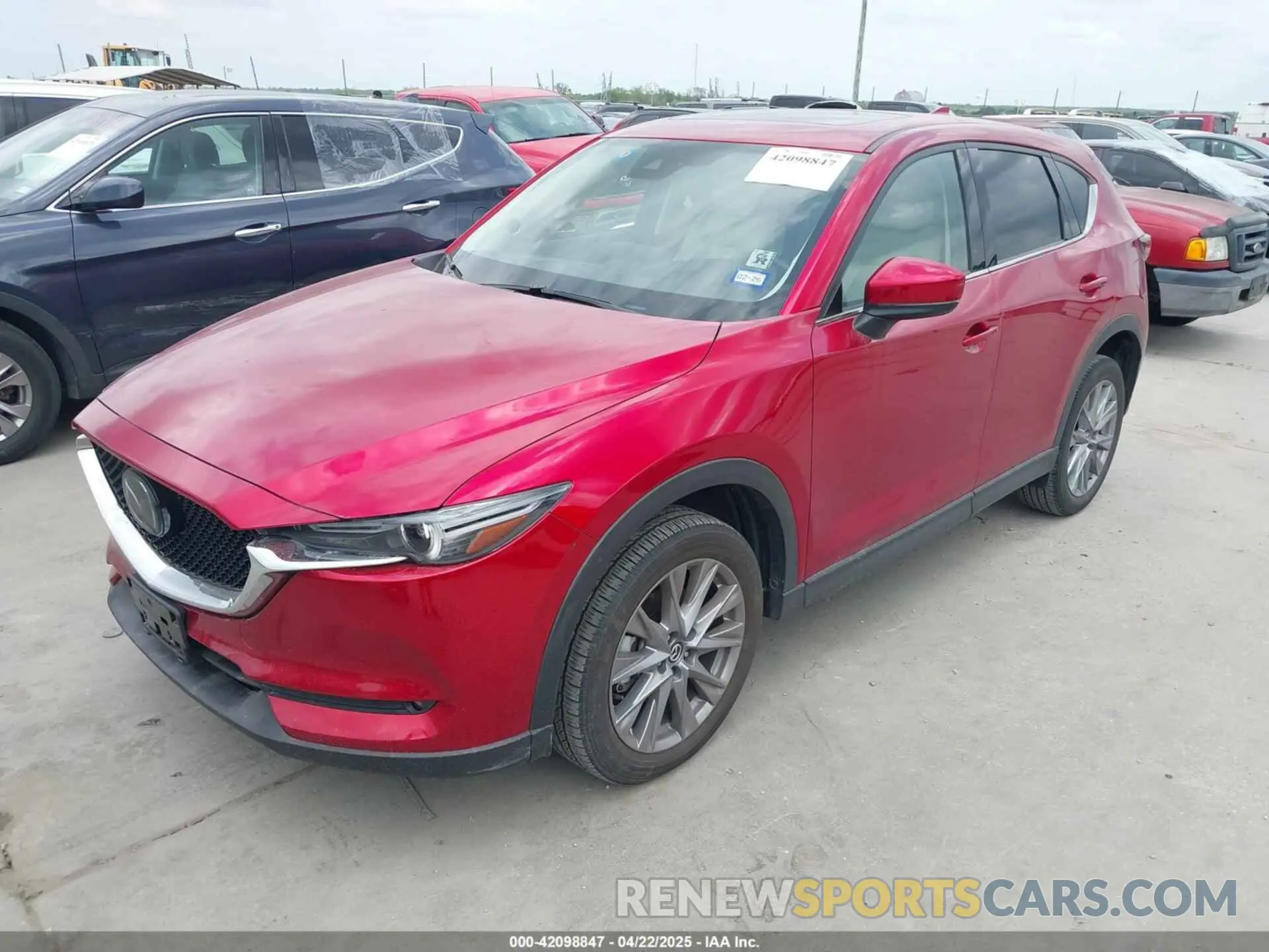 2 fotografías del automóvil dañado JM3KFBAY8M0451567 MAZDA CX-5 2021
