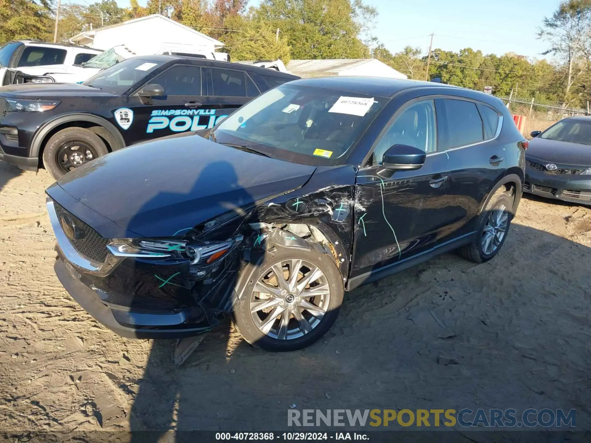 2 fotografías del automóvil dañado JM3KFBAYXM0465762 MAZDA CX-5 2021