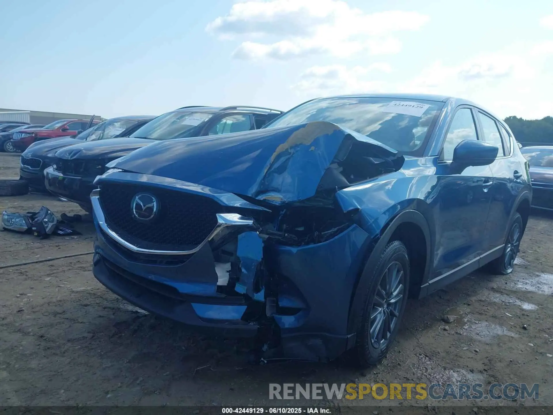 2 fotografías del automóvil dañado JM3KFBBMXM0417657 MAZDA CX-5 2021
