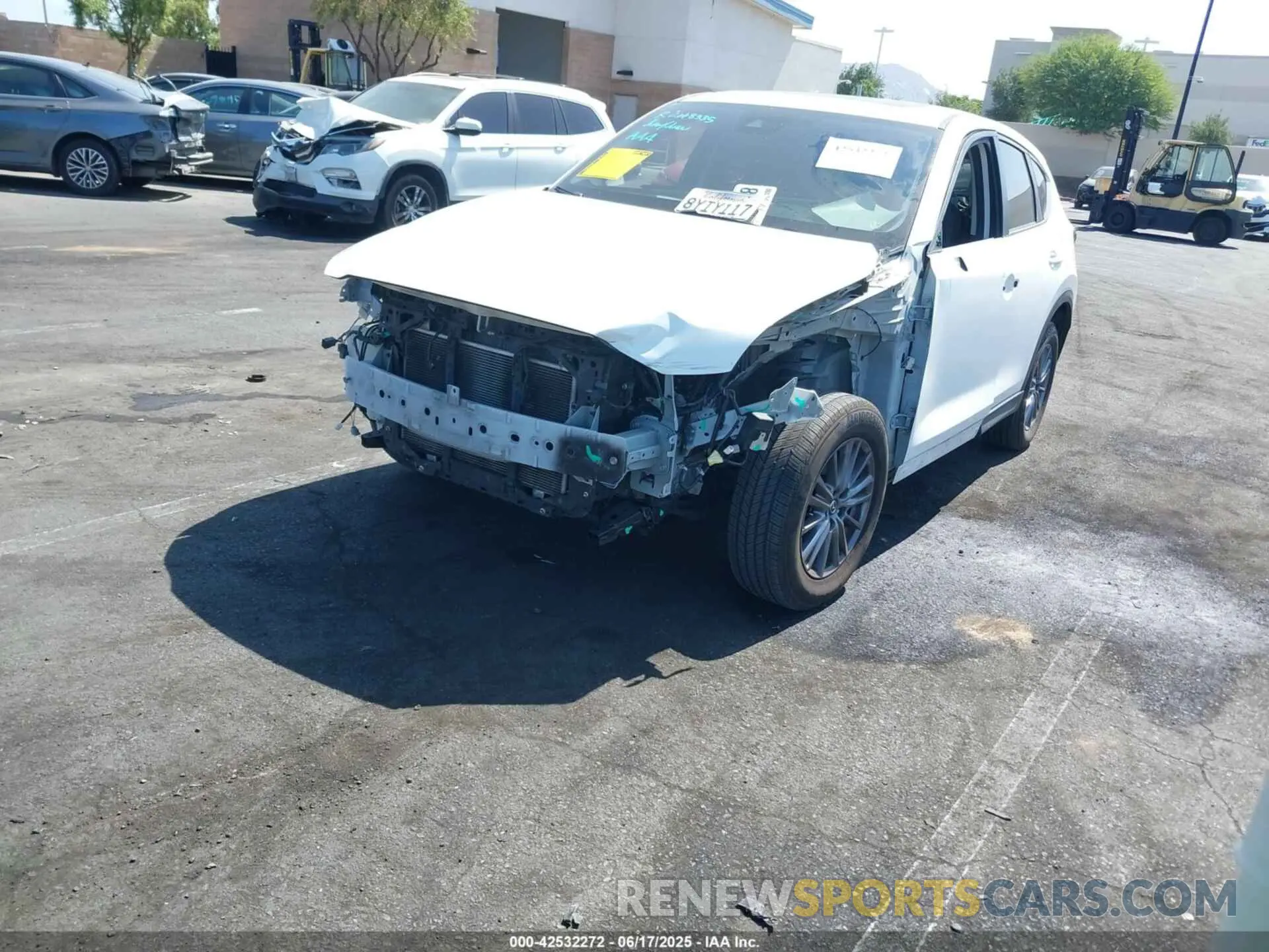 2 fotografías del automóvil dañado JM3KFBCM2M0487832 MAZDA CX-5 2021