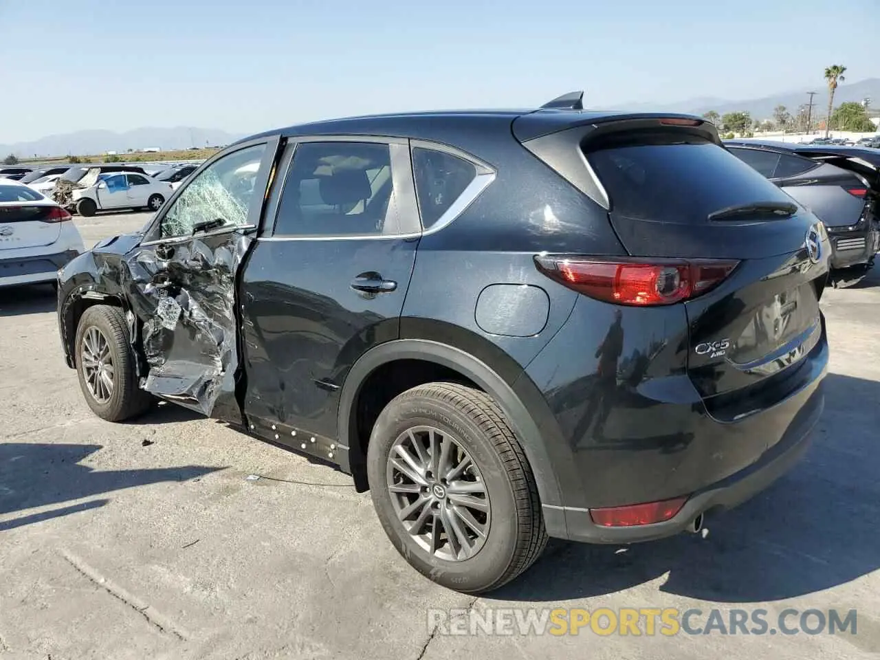 2 fotografías del automóvil dañado JM3KFBCM8M0495899 MAZDA CX-5 2021