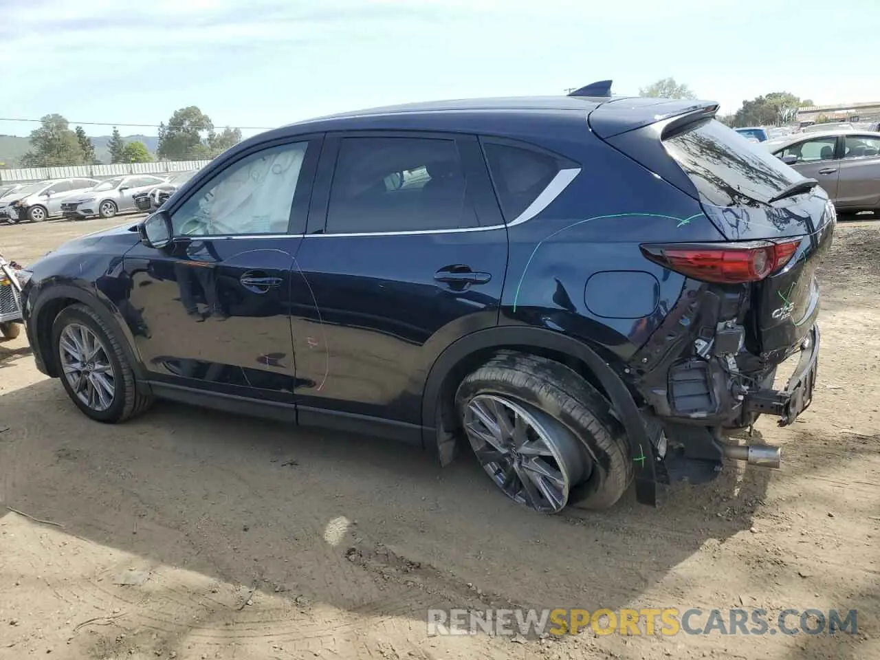 2 fotografías del automóvil dañado JM3KFBDM2M0494679 MAZDA CX-5 2021