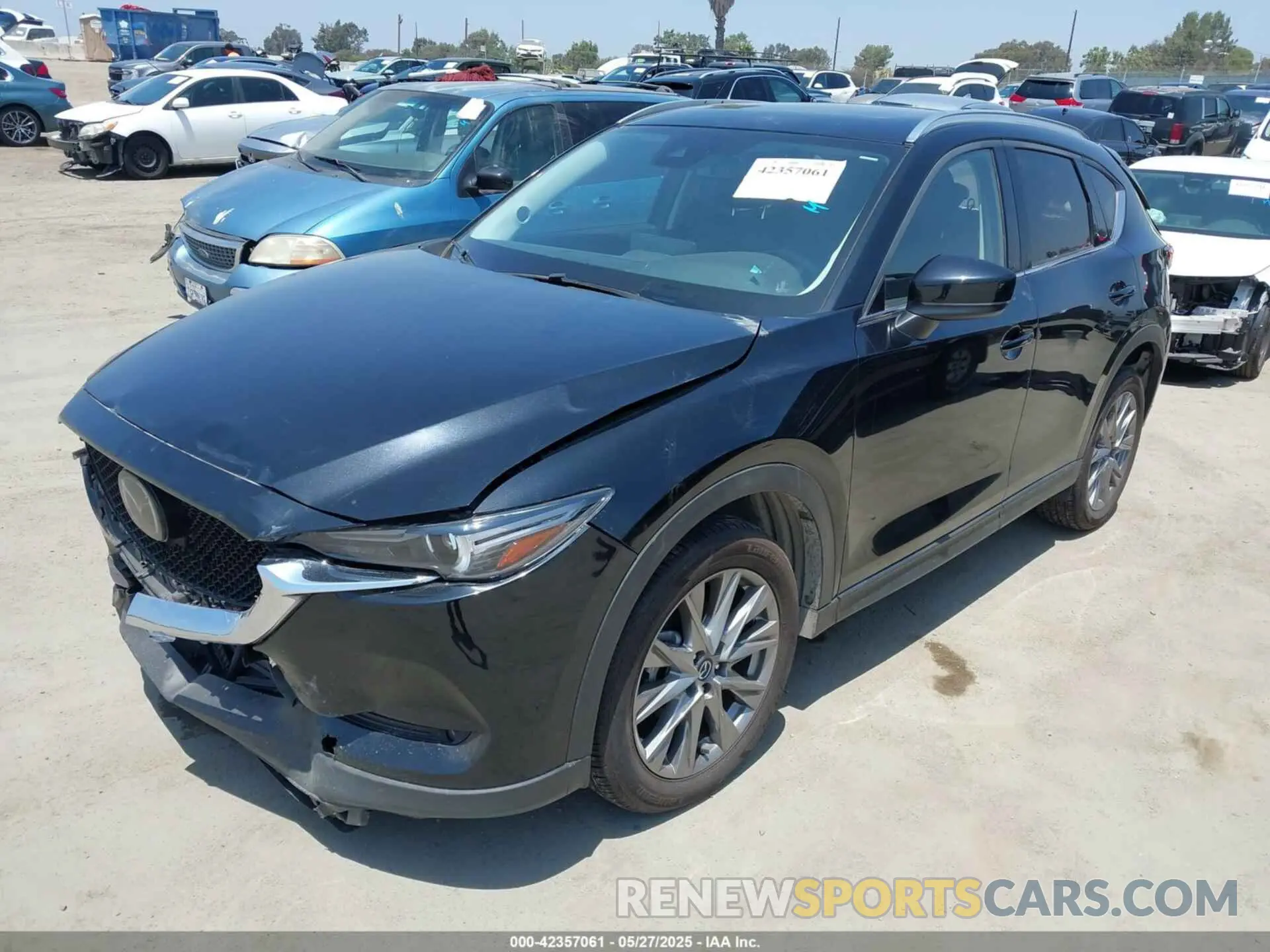 2 fotografías del automóvil dañado JM3KFBDMXM1487182 MAZDA CX-5 2021
