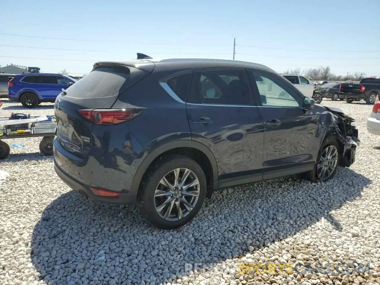 3 fotografías del automóvil dañado JM3KFBEY5M0439354 MAZDA CX-5 2021