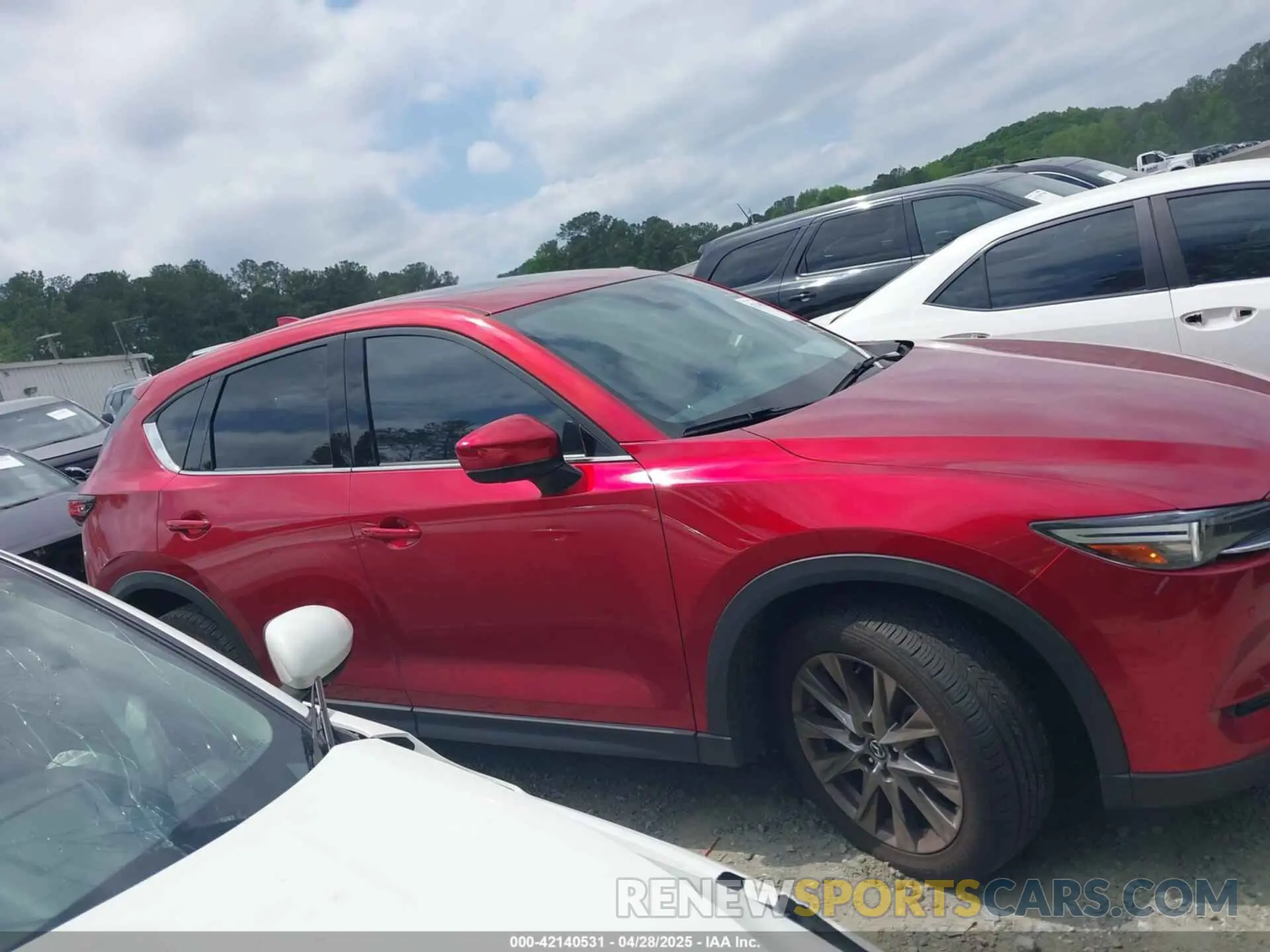 13 fotografías del automóvil dañado JM3KFBEY6M0419842 MAZDA CX-5 2021