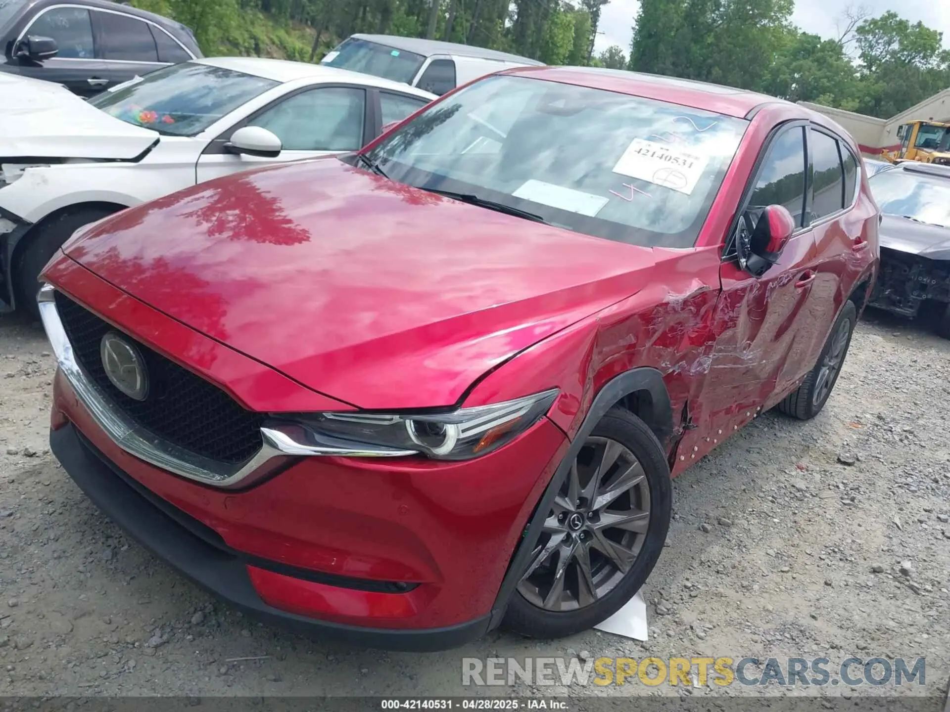 2 fotografías del automóvil dañado JM3KFBEY6M0419842 MAZDA CX-5 2021