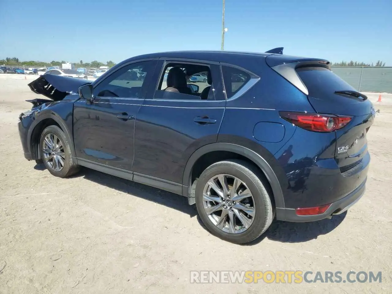 2 fotografías del automóvil dañado JM3KFBEYXM0453766 MAZDA CX-5 2021