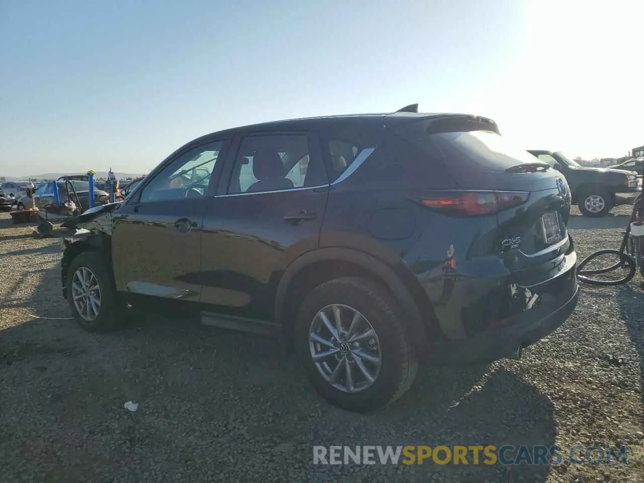 2 fotografías del automóvil dañado JM3KFBAM0N0567375 MAZDA CX-5 2022