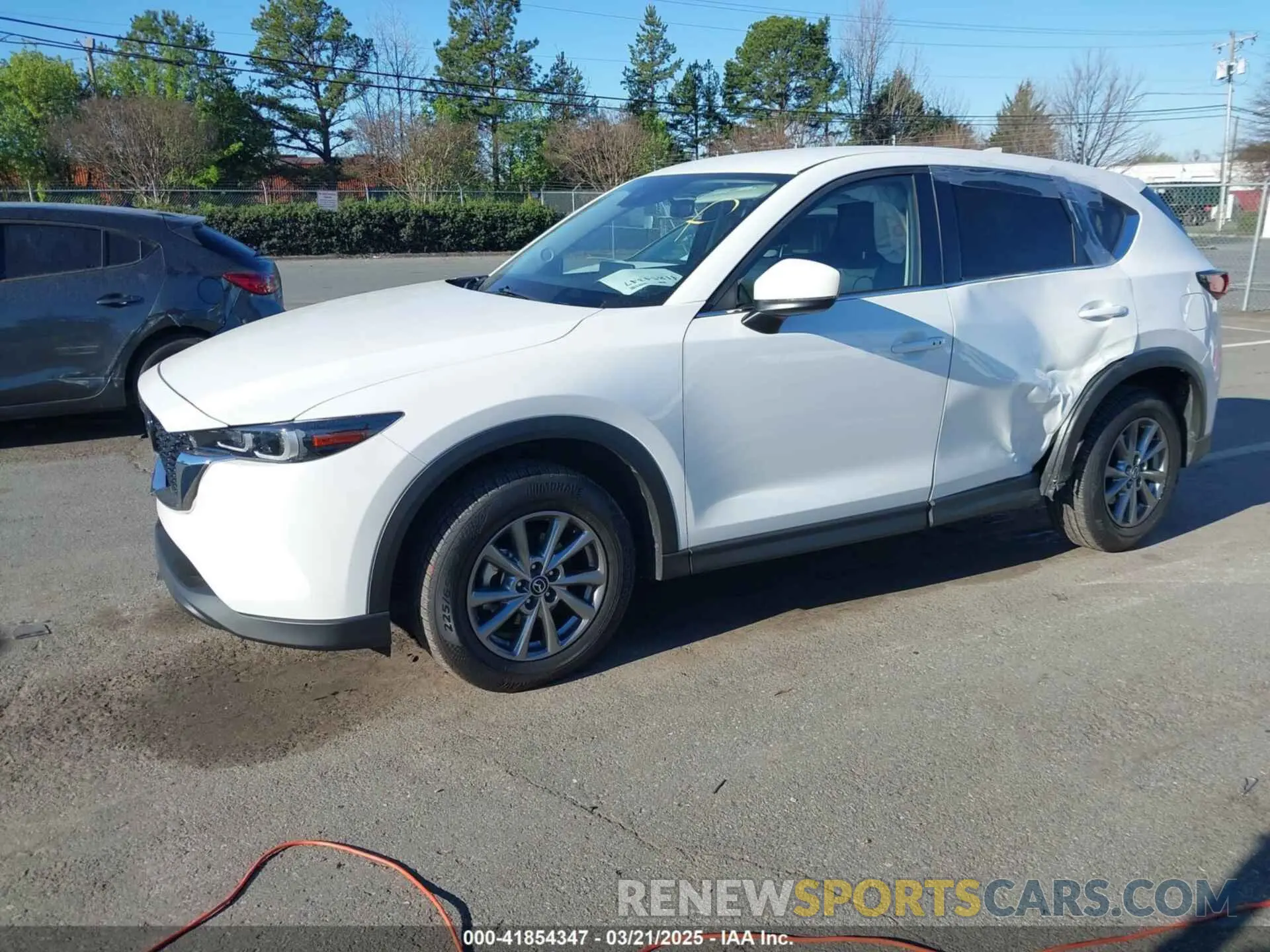 2 fotografías del automóvil dañado JM3KFBBM2N0558725 MAZDA CX-5 2022