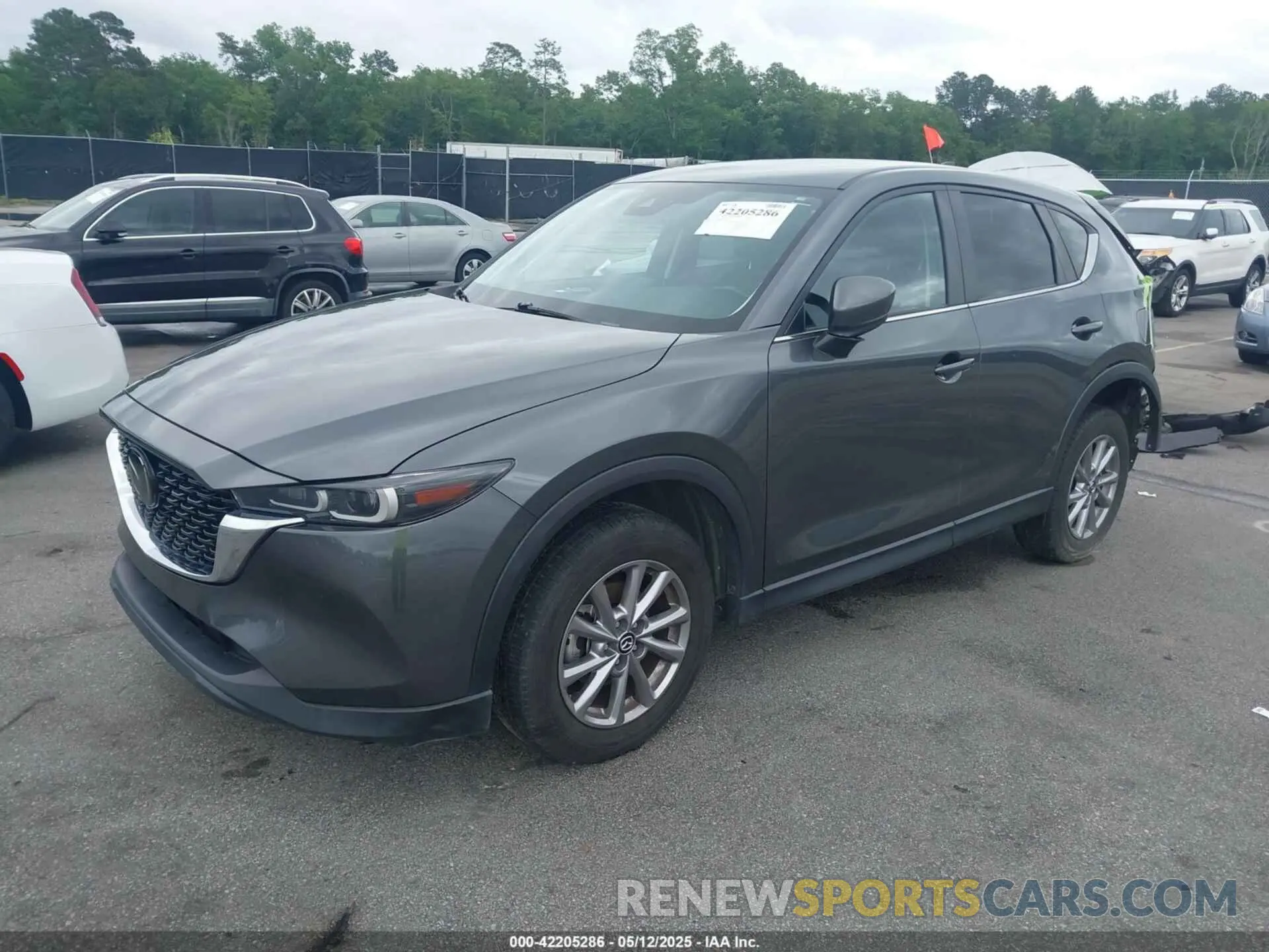 2 fotografías del automóvil dañado JM3KFBBM7N0533674 MAZDA CX-5 2022