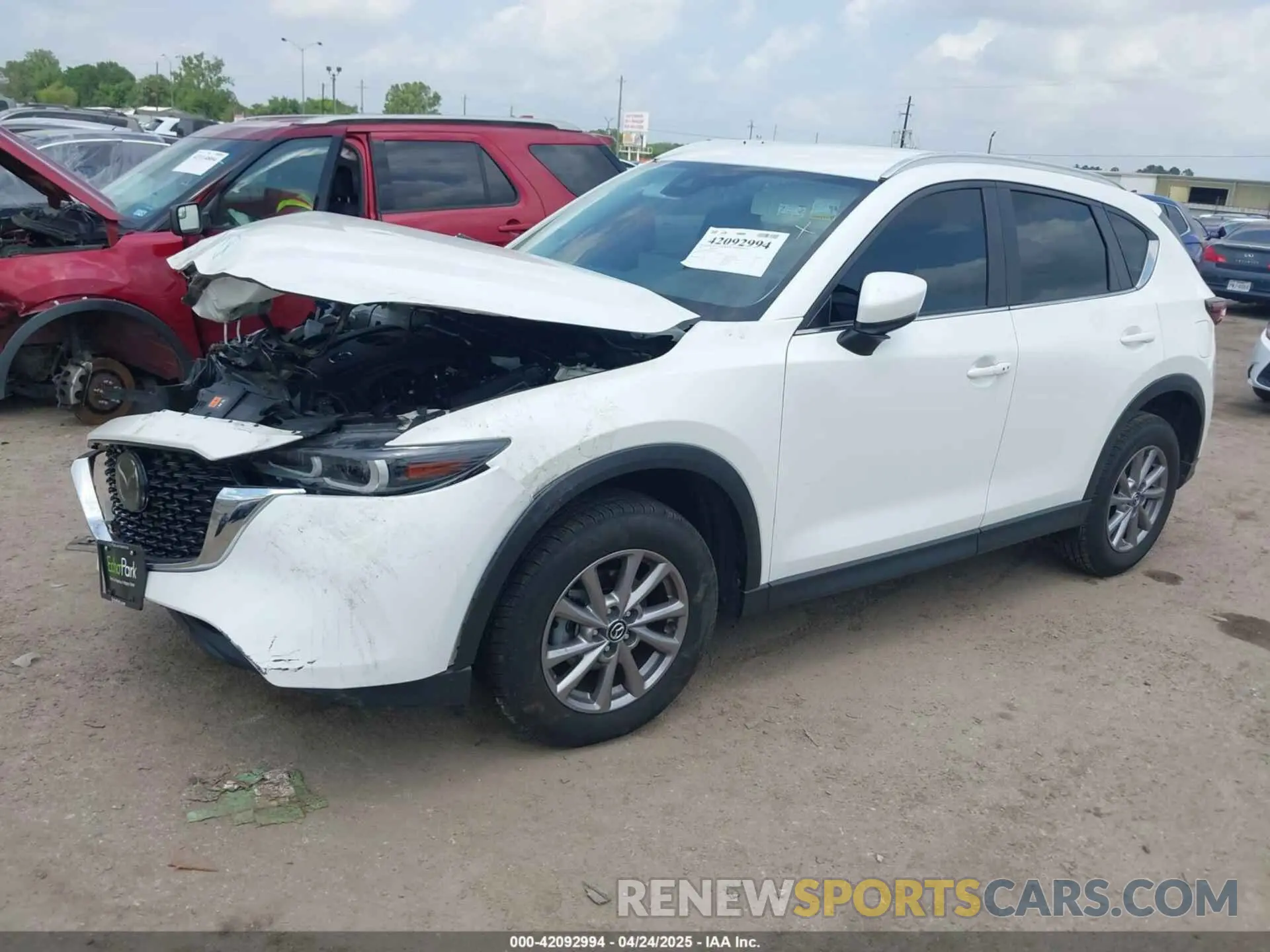 2 fotografías del automóvil dañado JM3KFBBM7N0533805 MAZDA CX-5 2022