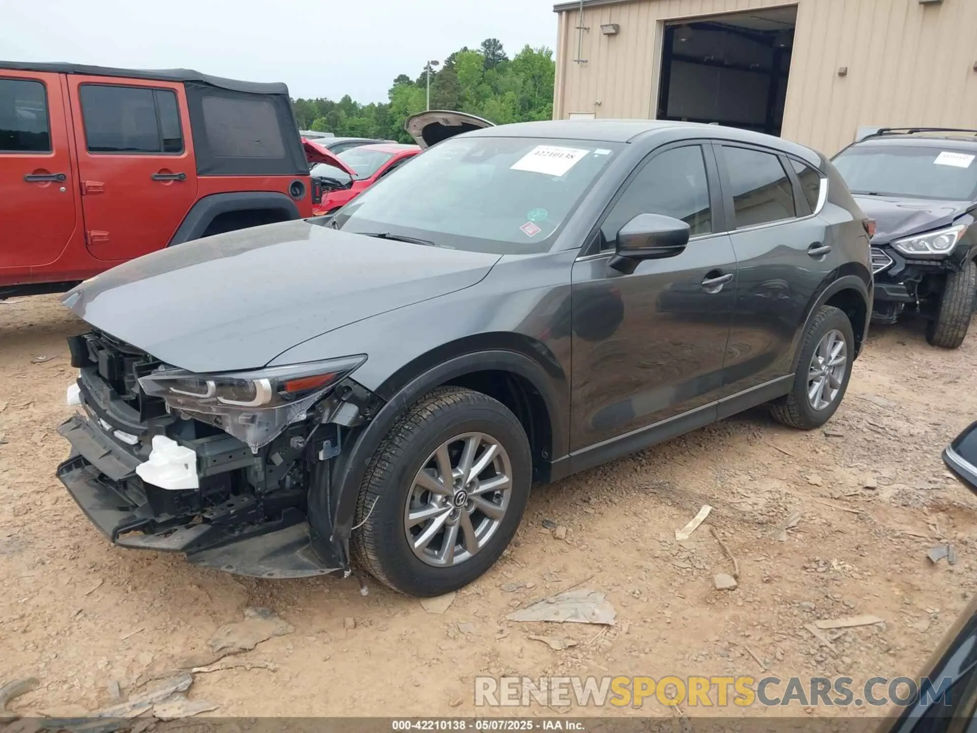 2 fotografías del automóvil dañado JM3KFBBMXN0634546 MAZDA CX-5 2022