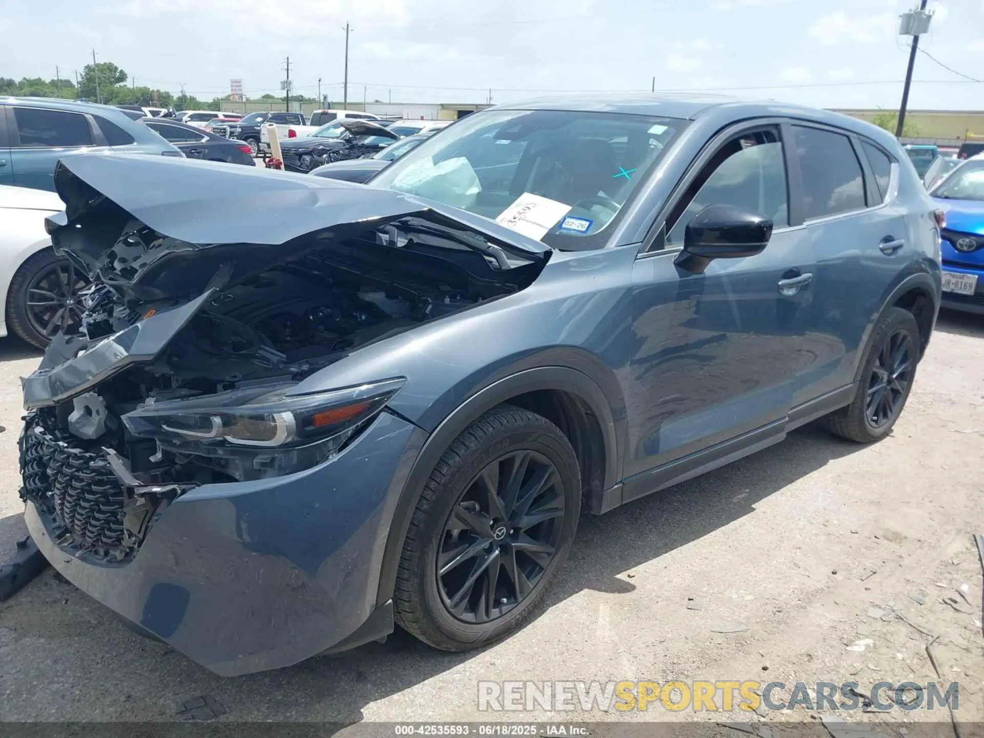 2 fotografías del automóvil dañado JM3KFBCM2N0571117 MAZDA CX-5 2022