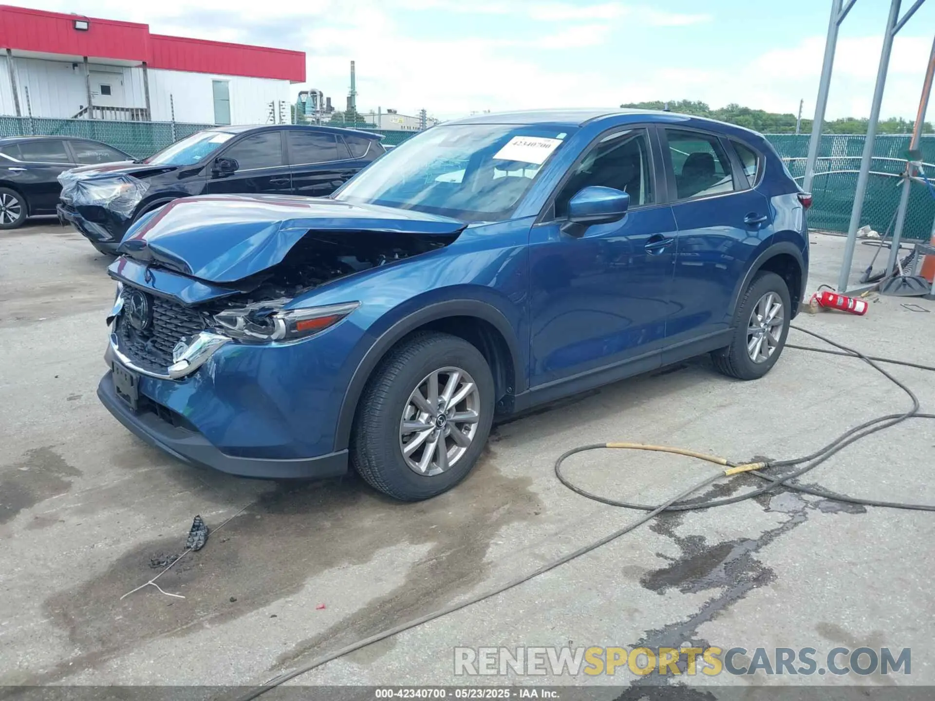 2 fotografías del automóvil dañado JM3KFBAM2P0126351 MAZDA CX-5 2023
