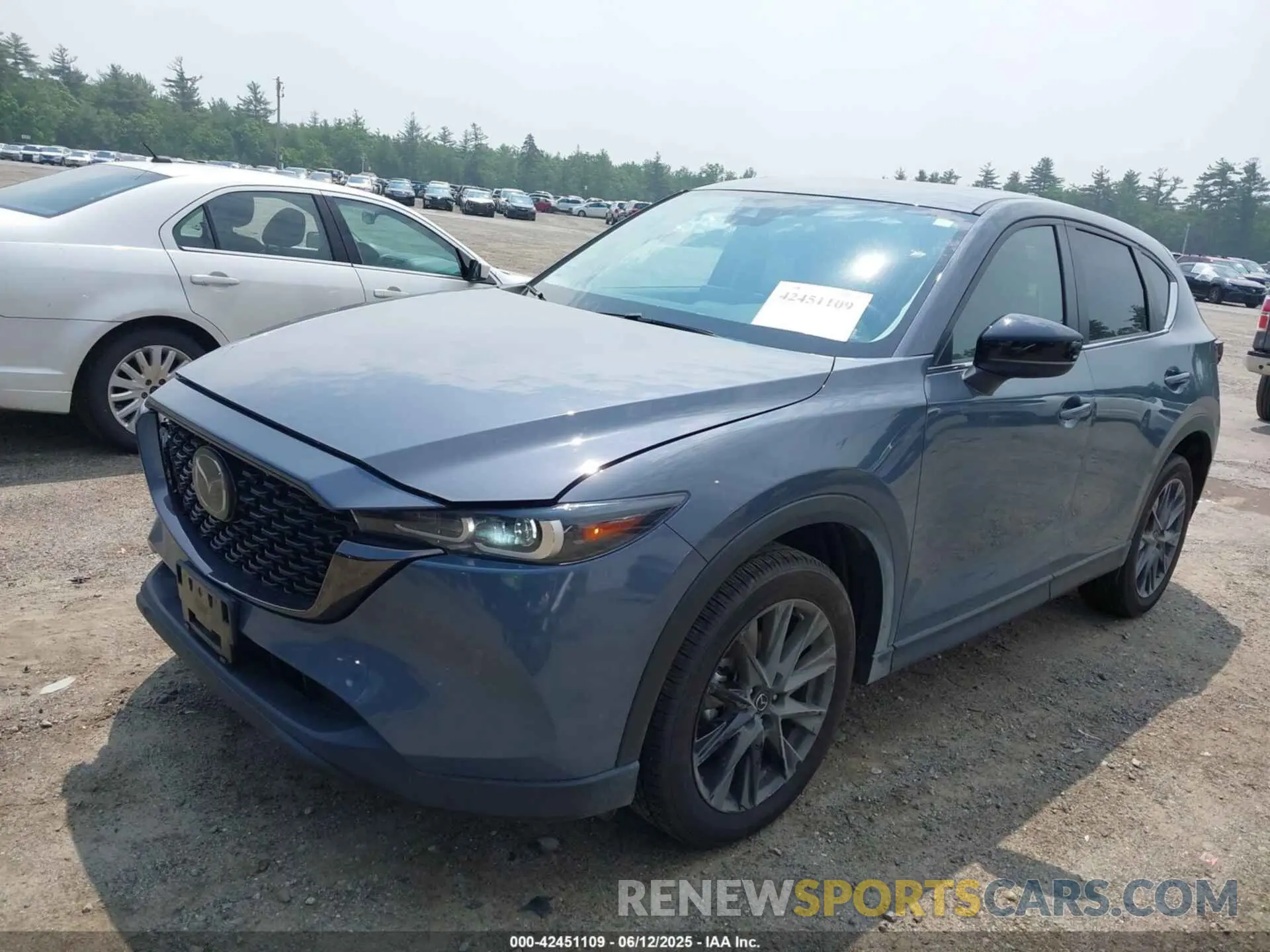 2 fotografías del automóvil dañado JM3KFBCM5P0179462 MAZDA CX-5 2023