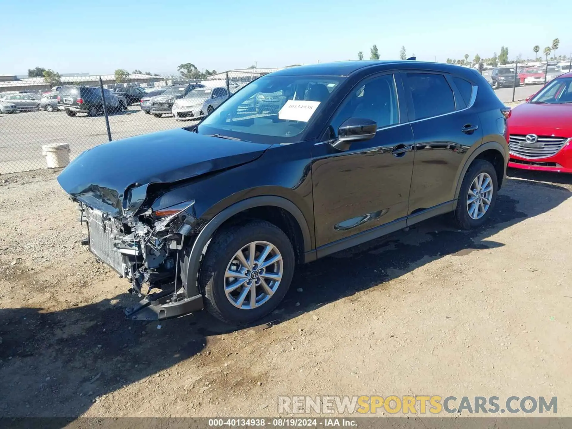 2 fotografías del automóvil dañado JM3KFBCMXP0148529 MAZDA CX-5 2023