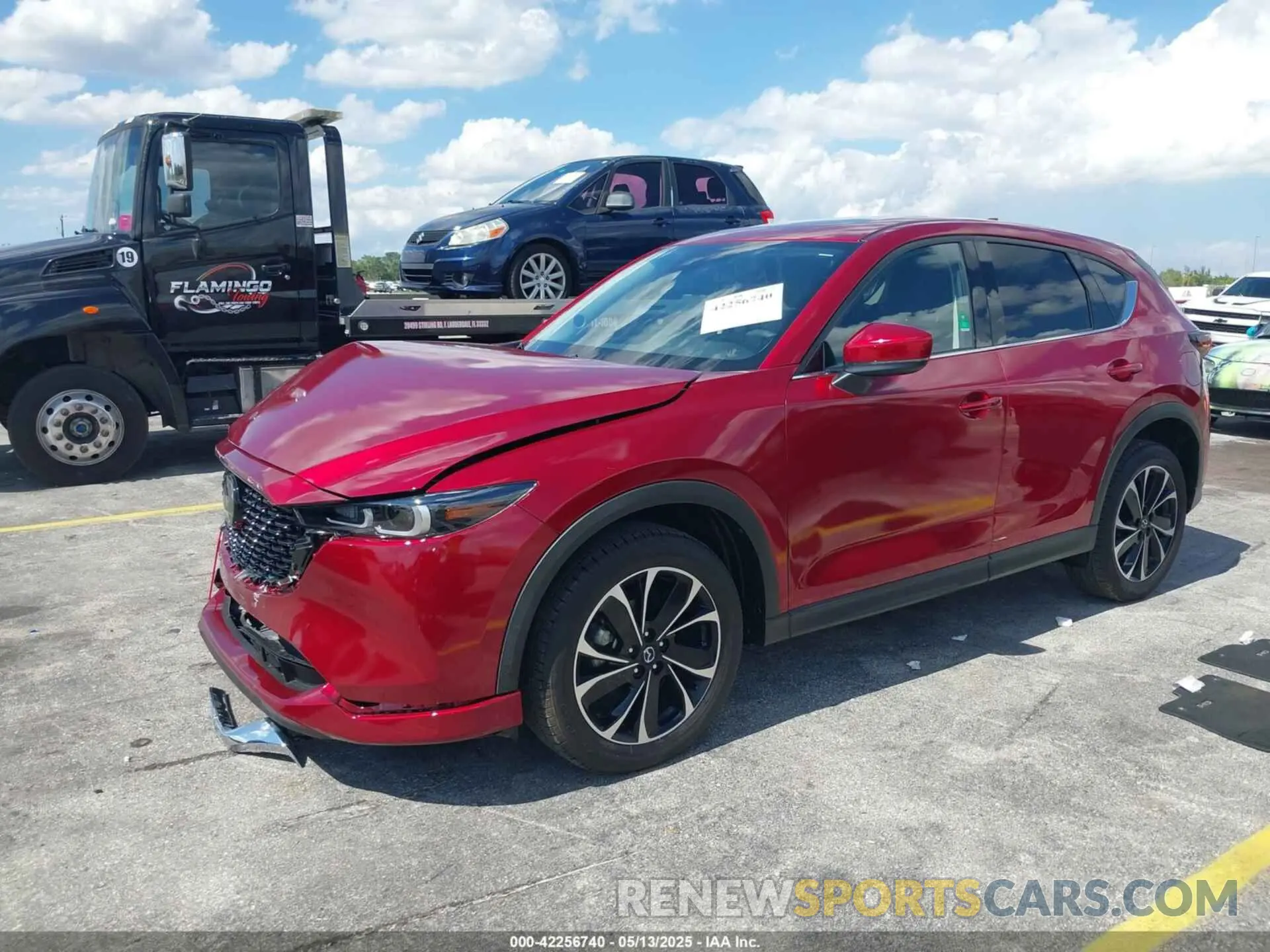 2 fotografías del automóvil dañado JM3KFBDM0P0219901 MAZDA CX-5 2023