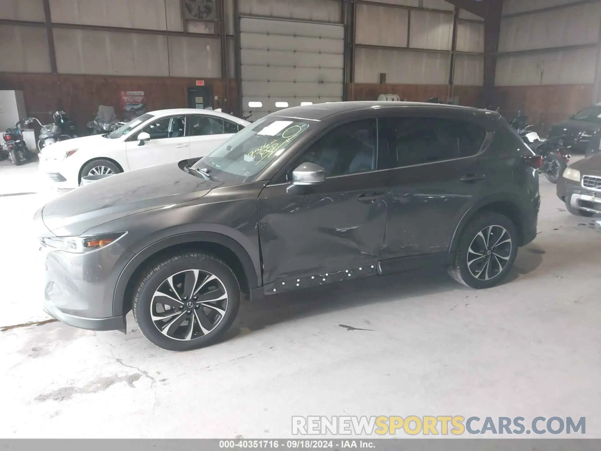 2 fotografías del automóvil dañado JM3KFBDM5P0267412 MAZDA CX-5 2023
