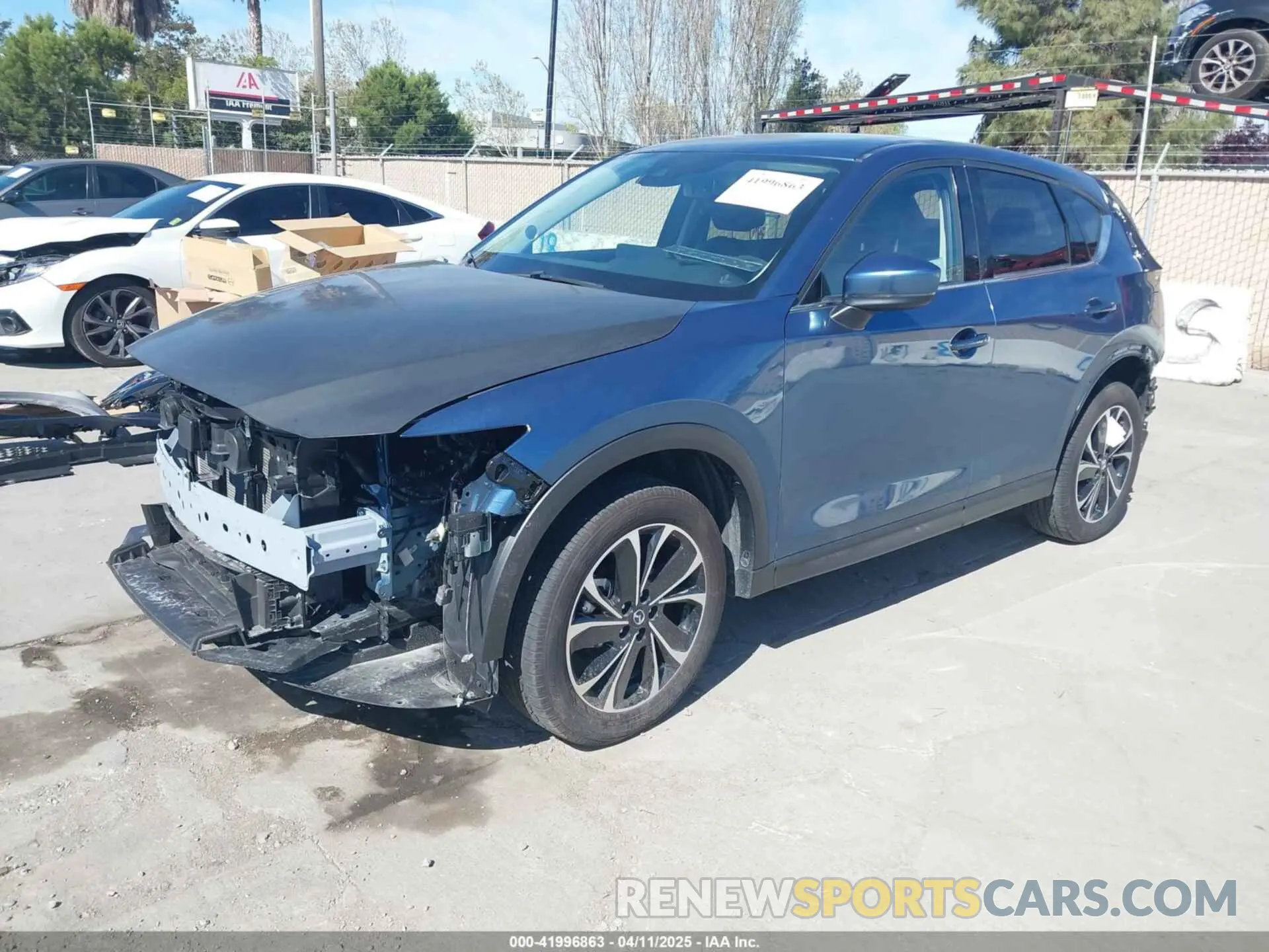 2 fotografías del automóvil dañado JM3KFBDM7P0233374 MAZDA CX-5 2023