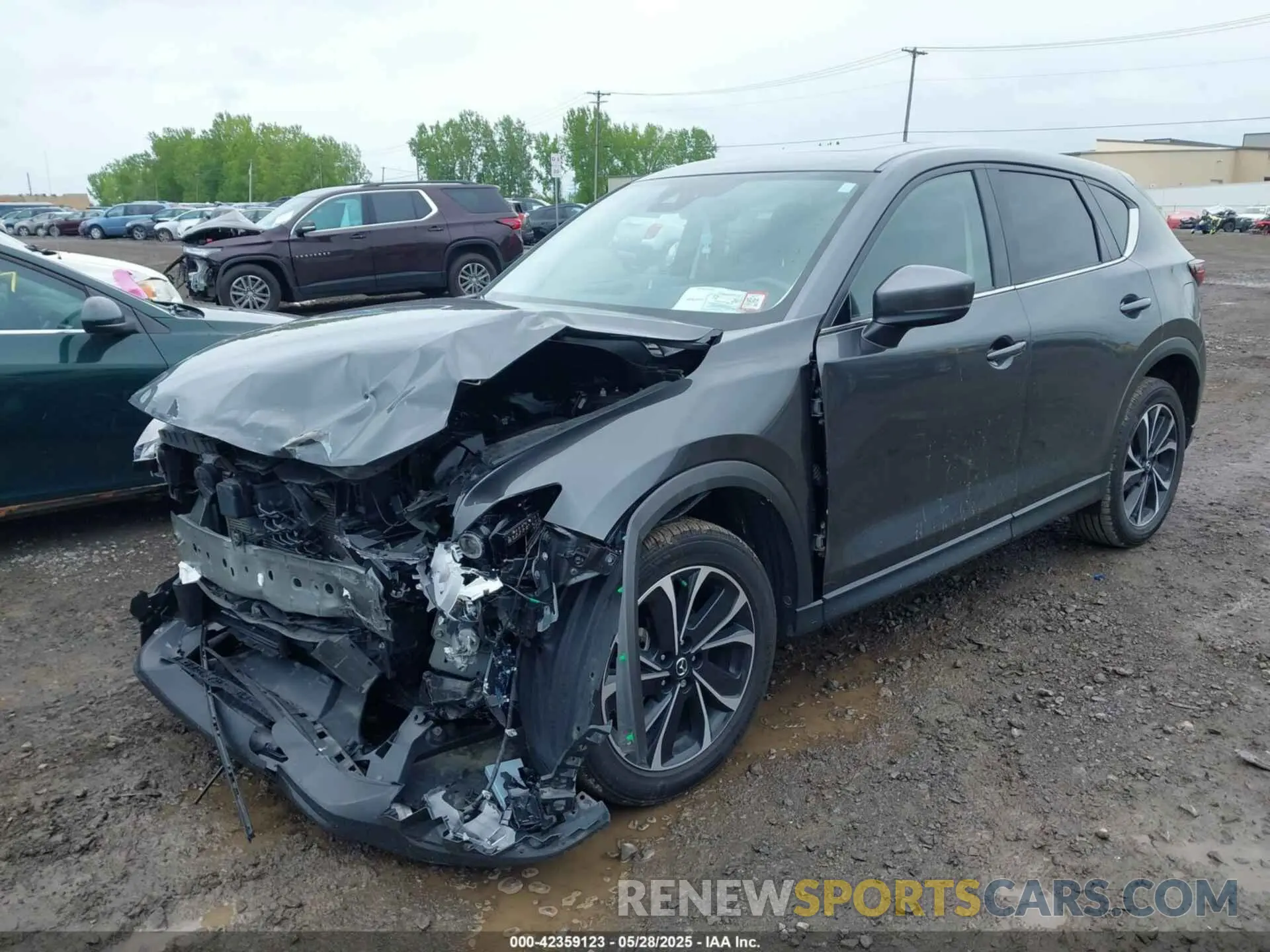 2 fotografías del automóvil dañado JM3KFBDMXP0142955 MAZDA CX-5 2023