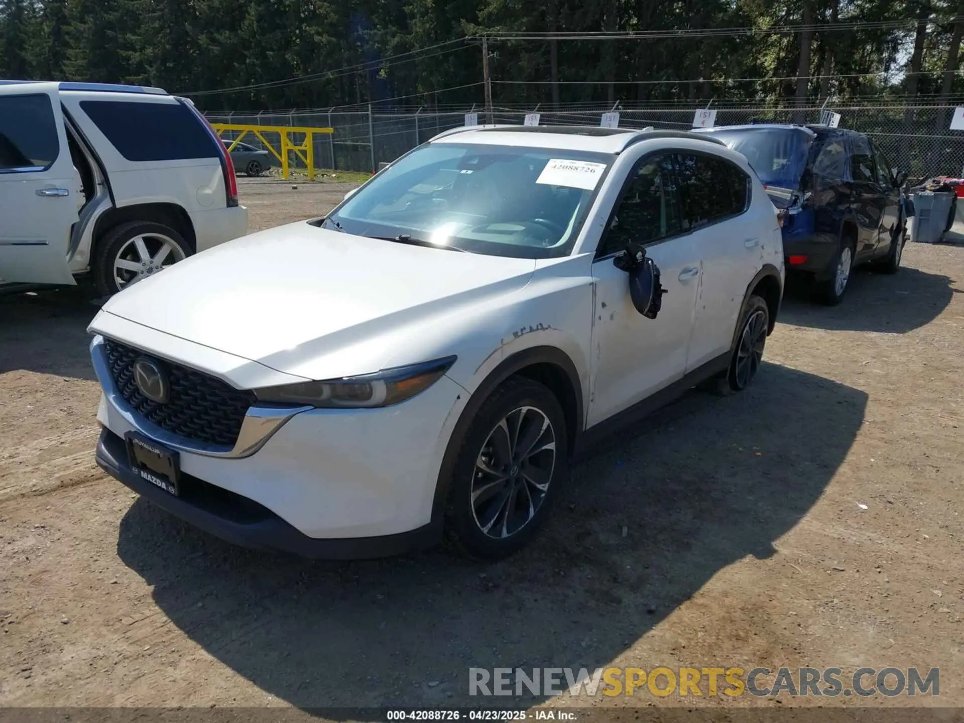 2 fotografías del automóvil dañado JM3KFBEM9P0132061 MAZDA CX-5 2023