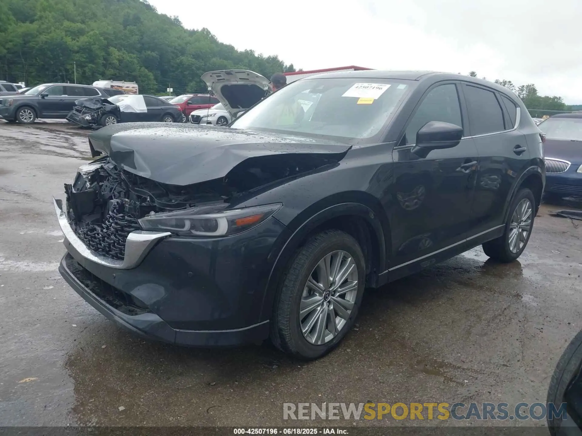 2 fotografías del automóvil dañado JM3KFBXYXP0126818 MAZDA CX-5 2023