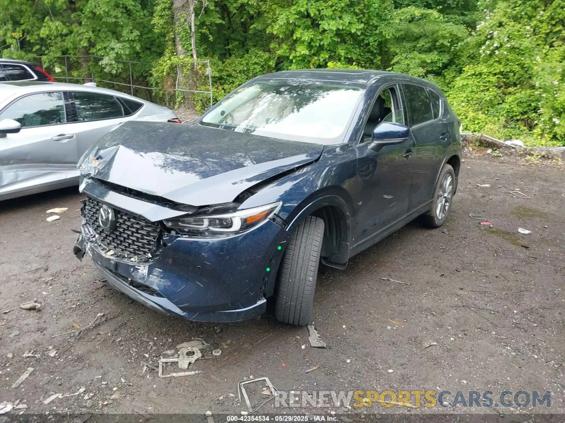 2 fotografías del automóvil dañado JM3KFBEM2S0621927 MAZDA CX-5 2025