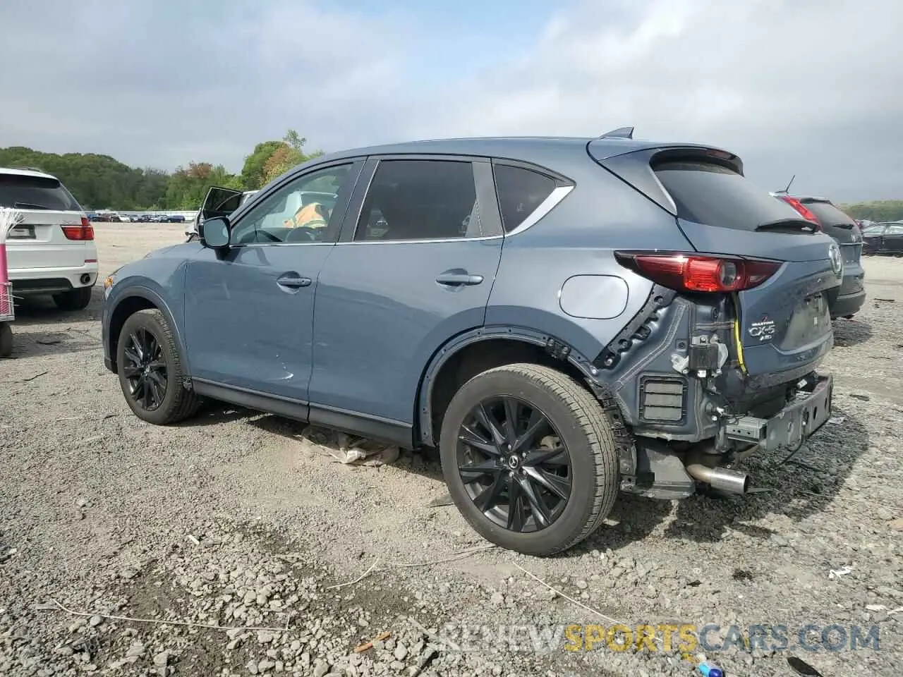 2 fotografías del automóvil dañado JM3KFBCY3M0378847 MAZDA CX-5 CARBO 2021