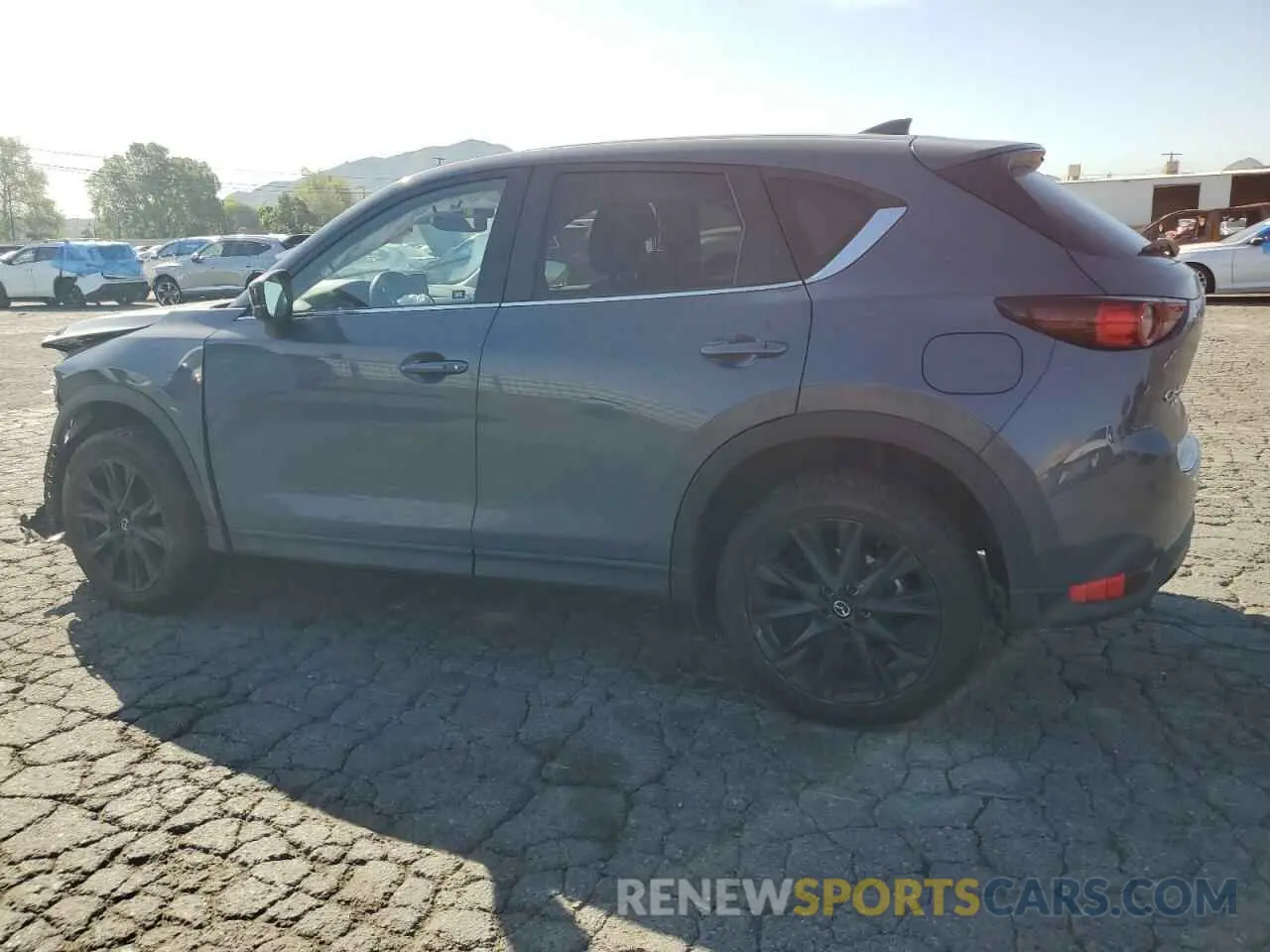 2 fotografías del automóvil dañado JM3KFBCY7M0439553 MAZDA CX-5 CARBO 2021