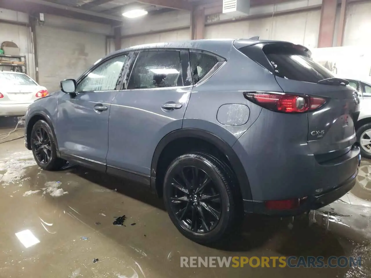 2 fotografías del automóvil dañado JM3KFBCY9M0400009 MAZDA CX-5 CARBO 2021