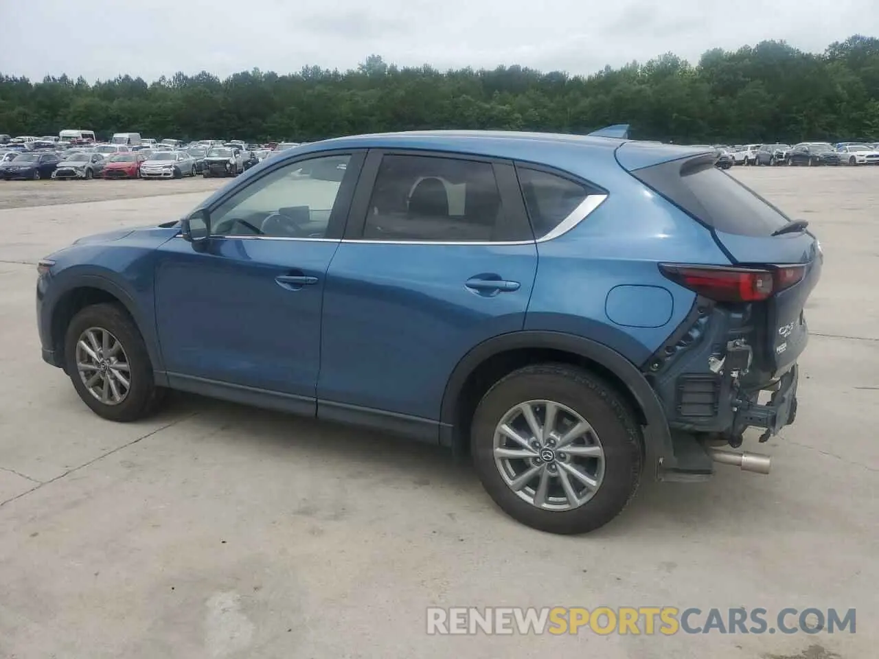 2 fotografías del automóvil dañado JM3KFBCM0N0567552 MAZDA CX-5 PREFE 2022