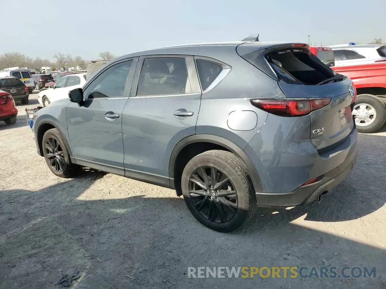 2 fotografías del automóvil dañado JM3KFBCM1N0532499 MAZDA CX-5 PREFE 2022