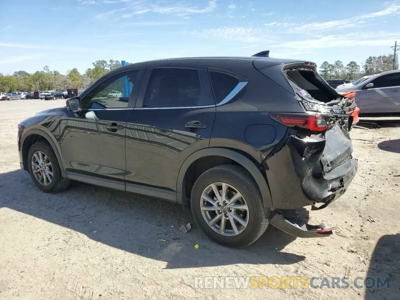 2 fotografías del automóvil dañado JM3KFBCM3N0570655 MAZDA CX-5 PREFE 2022