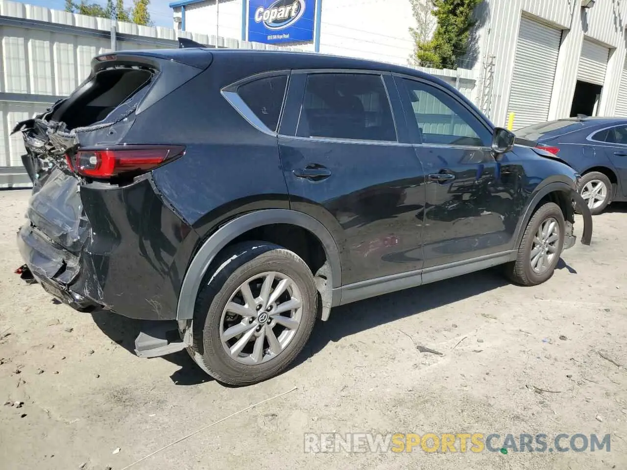 3 fotografías del automóvil dañado JM3KFBCM3N0570655 MAZDA CX-5 PREFE 2022