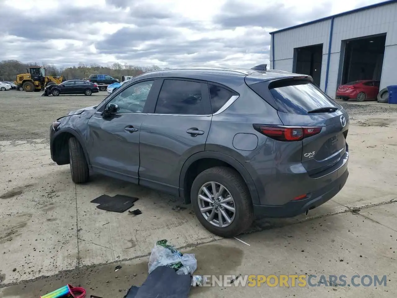 2 fotografías del automóvil dañado JM3KFBCM7N0567032 MAZDA CX-5 PREFE 2022