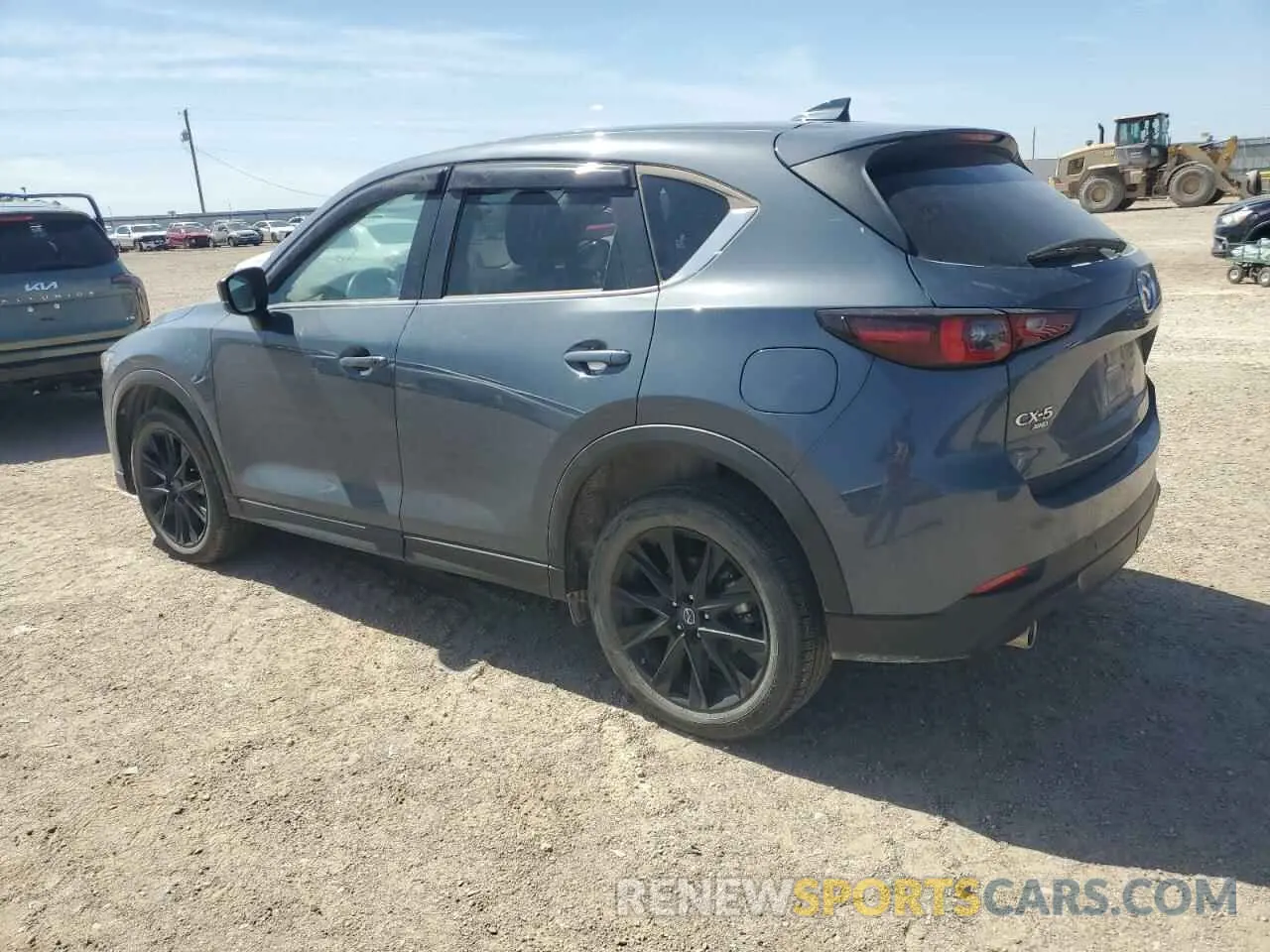 2 fotografías del automóvil dañado JM3KFBCM0P0222198 MAZDA CX-5 PREFE 2023