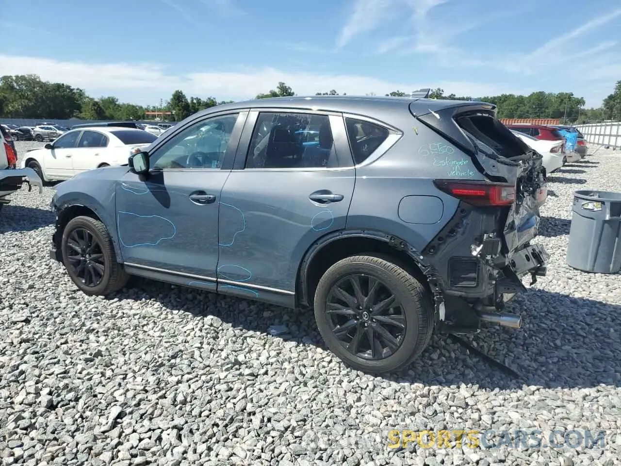 2 fotografías del automóvil dañado JM3KFBCM1P0145003 MAZDA CX-5 PREFE 2023