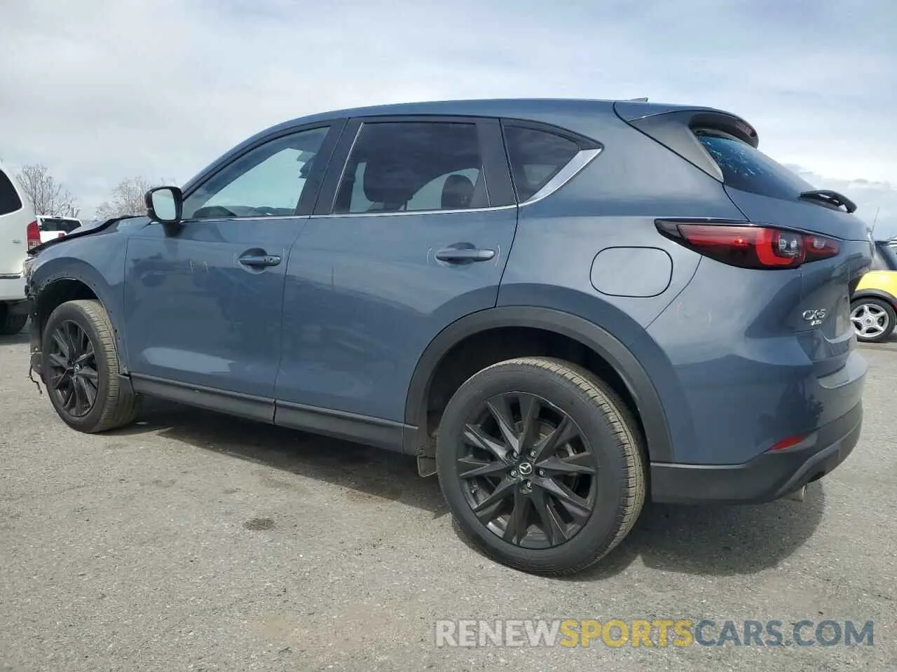 2 fotografías del automóvil dañado JM3KFBCM2P0292141 MAZDA CX-5 PREFE 2023
